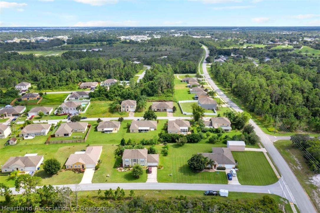 4755 Tarrega Street Sebring, FL 33872 - Photo 32 of 35 an aerial view of multiple house