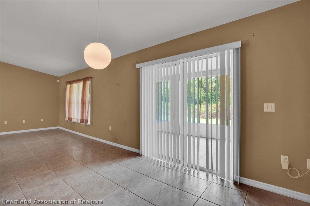 4755 Tarrega Street Sebring, FL 33872 - Photo 35 of 35 a view of an empty room with a window