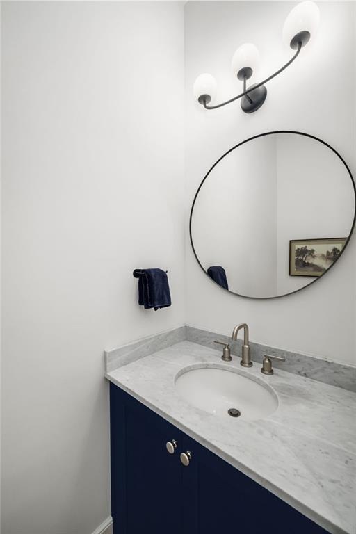 699 Eustace Street Southeast Atlanta, GA 30315 - Photo 17 of 53 a bathroom with a sink and a mirror