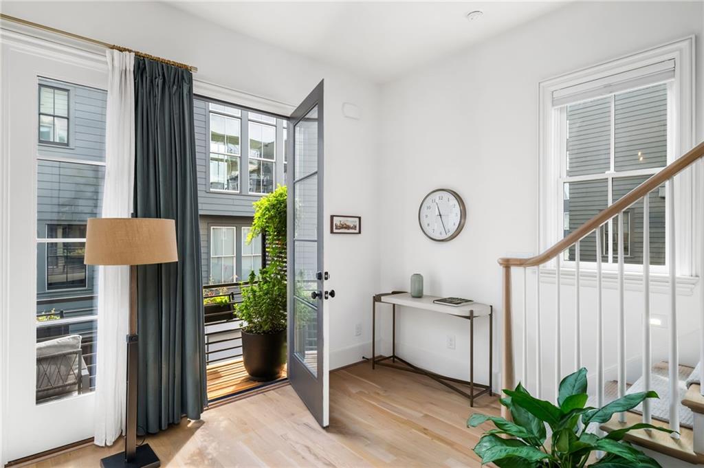 699 Eustace Street Southeast Atlanta, GA 30315 - Photo 19 of 53 a view of a hallway with entryway wooden floor and front door