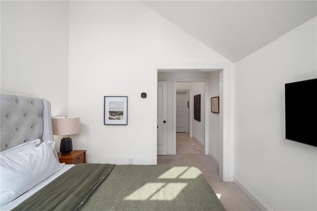 699 Eustace Street Southeast Atlanta, GA 30315 - Photo 25 of 53 a bedroom with a bed and a television