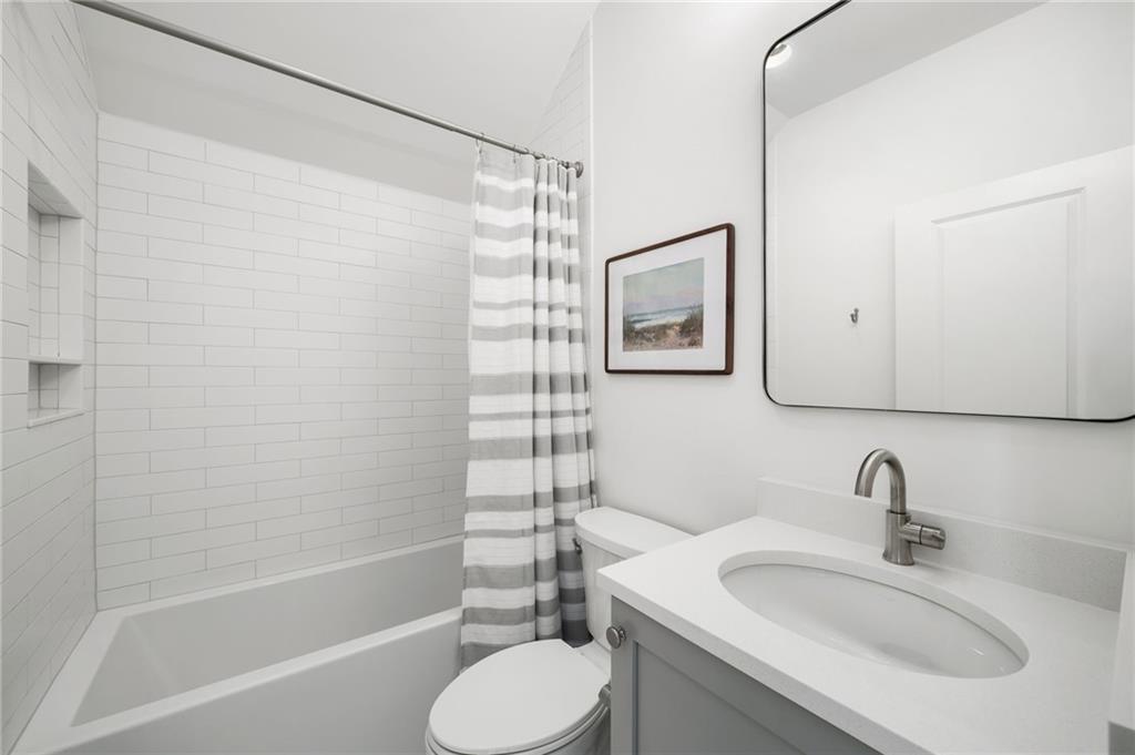 699 Eustace Street Southeast Atlanta, GA 30315 - Photo 35 of 53 a bathroom with a sink toilet and shower