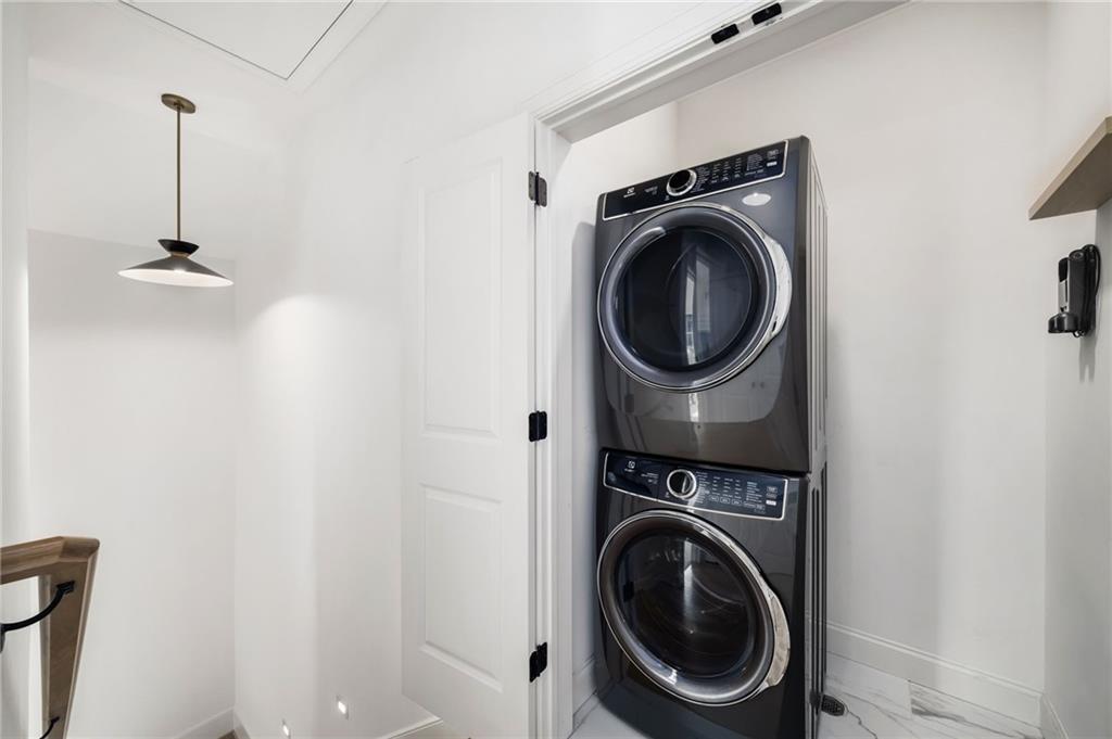 699 Eustace Street Southeast Atlanta, GA 30315 - Photo 37 of 53 a close view of a utility room with dryer and washer