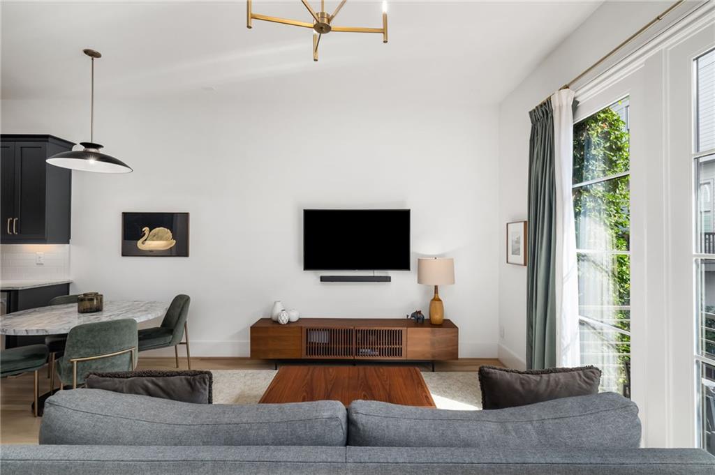 699 Eustace Street Southeast Atlanta, GA 30315 - Photo 6 of 53 a living room with furniture and a flat screen tv