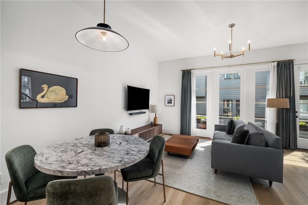 699 Eustace Street Southeast Atlanta, GA 30315 - Photo 8 of 53 a living room with furniture and a flat screen tv
