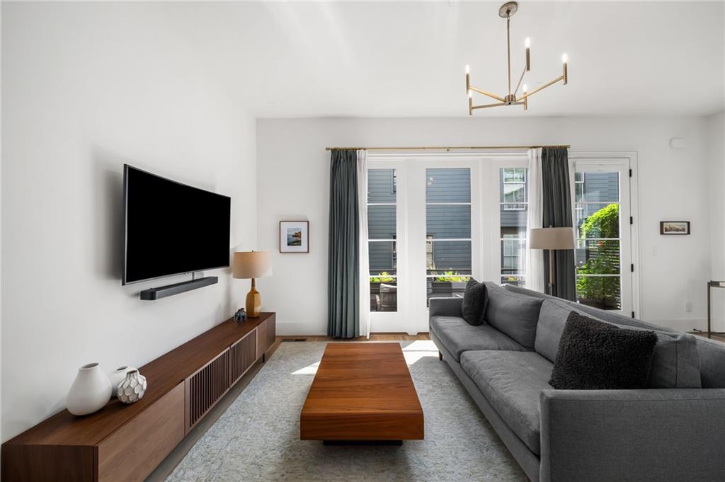 699 Eustace Street Southeast Atlanta, GA 30315 - Photo 9 of 53 a living room with furniture and a flat screen tv