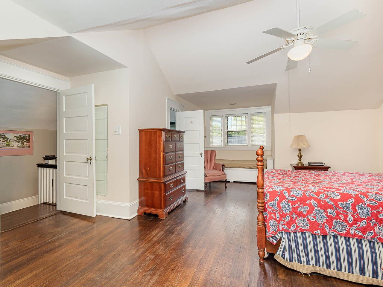 401 West Whitaker Mill Road Raleigh, NC 27608 - Photo 19 of 30 a bedroom with furniture and a window