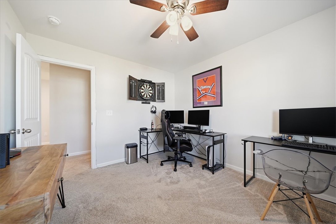 403 Seaborn Circle Pendleton, SC 29670 - Photo 24 of 47 This versatile room features plush carpeting and a convenient ceiling fan, ready for productivity or relaxation.