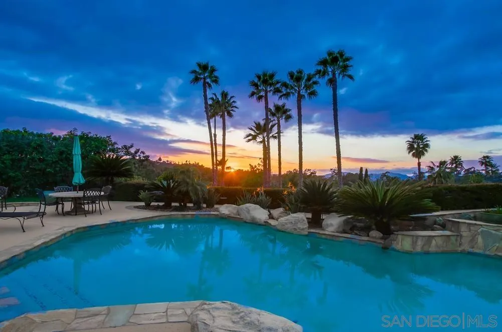 16157 Country Day Road Poway, CA 92064 - Photo 1 of 70 a view of a swimming pool with a patio