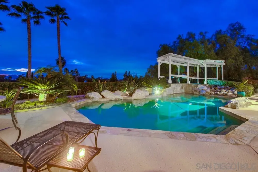 16157 Country Day Road Poway, CA 92064 - Photo 17 of 70 a view of a yard with plants and a patio