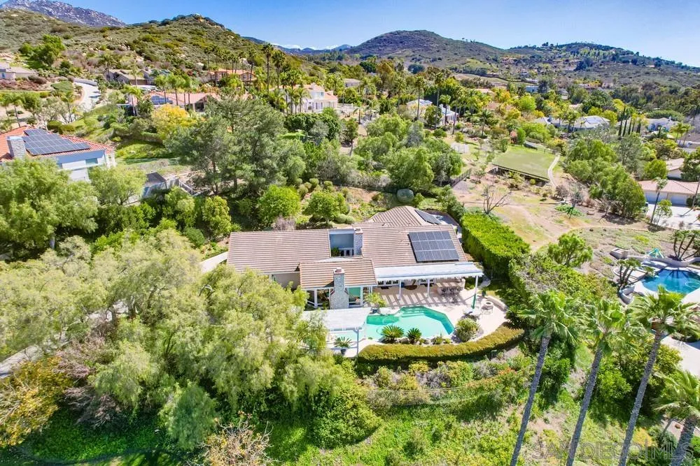 16157 Country Day Road Poway, CA 92064 - Photo 4 of 70 an aerial view of residential houses with outdoor space and trees