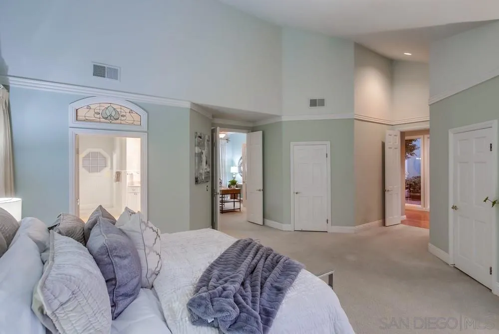 16157 Country Day Road Poway, CA 92064 - Photo 47 of 70 a bed room with a bed and a mirror