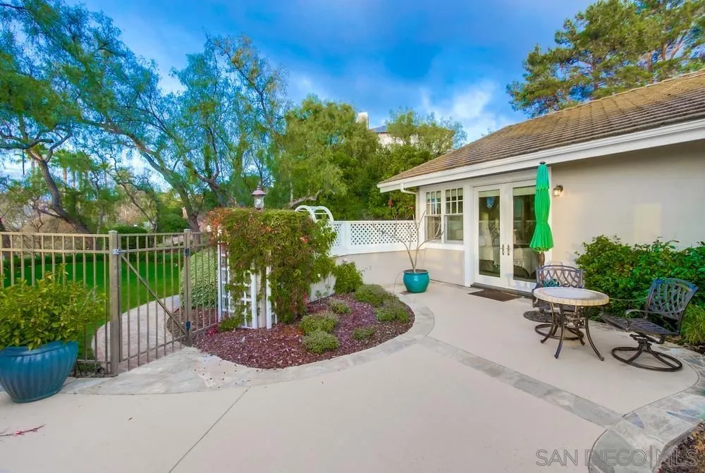 16157 Country Day Road Poway, CA 92064 - Photo 65 of 70 a view of a chair and table in backyard of the house