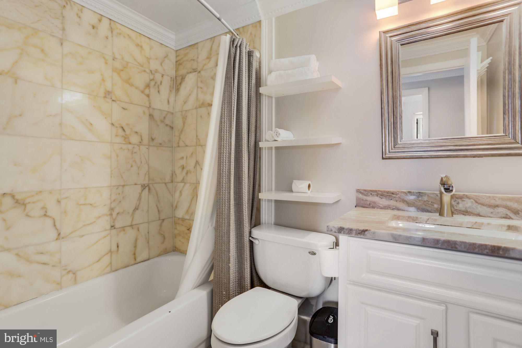 1763 Columbia Road Northwest, Unit 509 Washington, DC 20009 - Photo 25 of 39 Bathroom with Granite Counter top