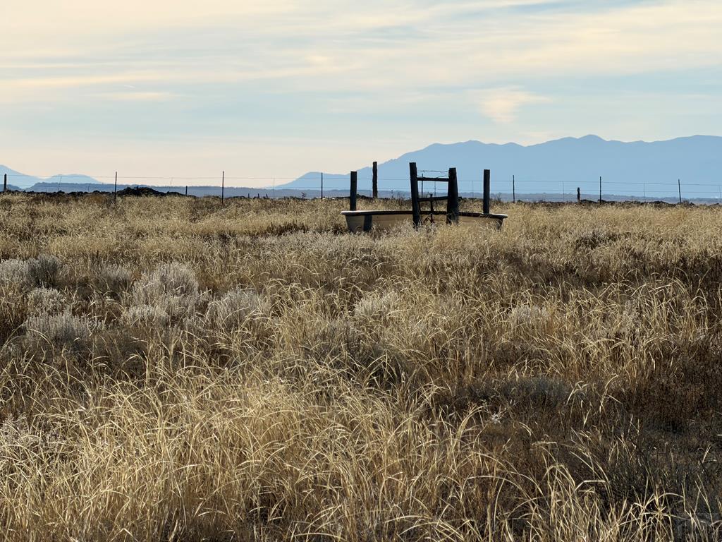 3471 40th Lane Avondale, CO 81022 - Photo 4 of 14 a view of a large body of water with a house in the background