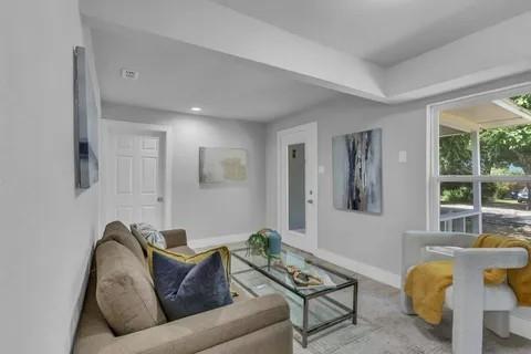 110 North Hillside Street Red Oak, TX 75154 - Photo 12 of 25 Living room featuring baseboards and recessed lighting