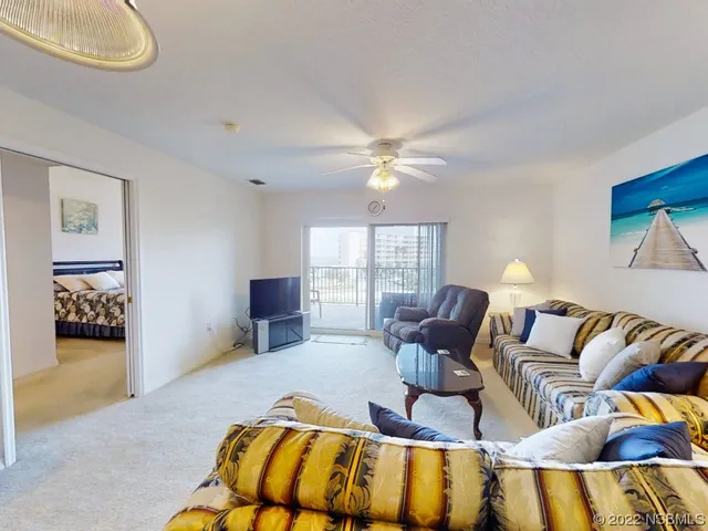a spacious bedroom with a bed and window