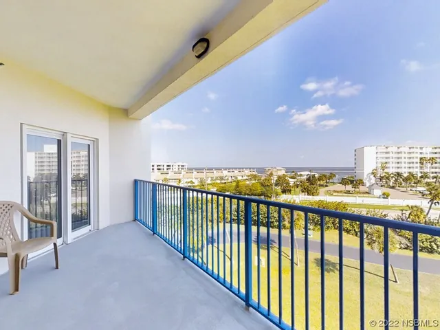 a view of balcony with city