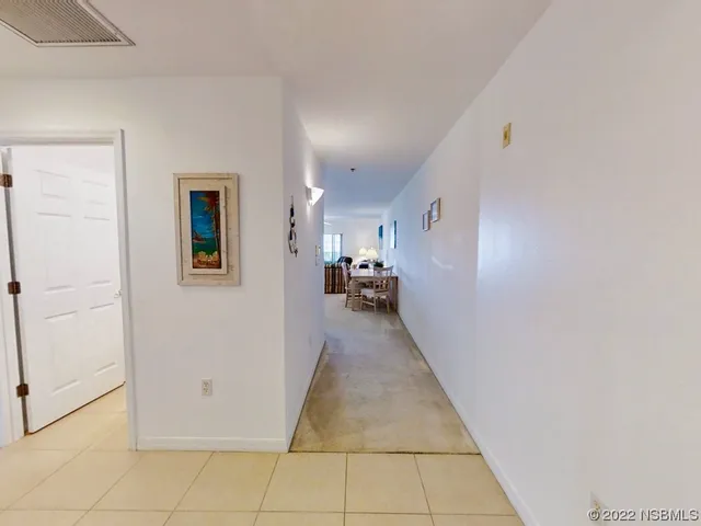 a view of a hallway view with living room