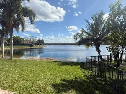a view of a lake with a garden