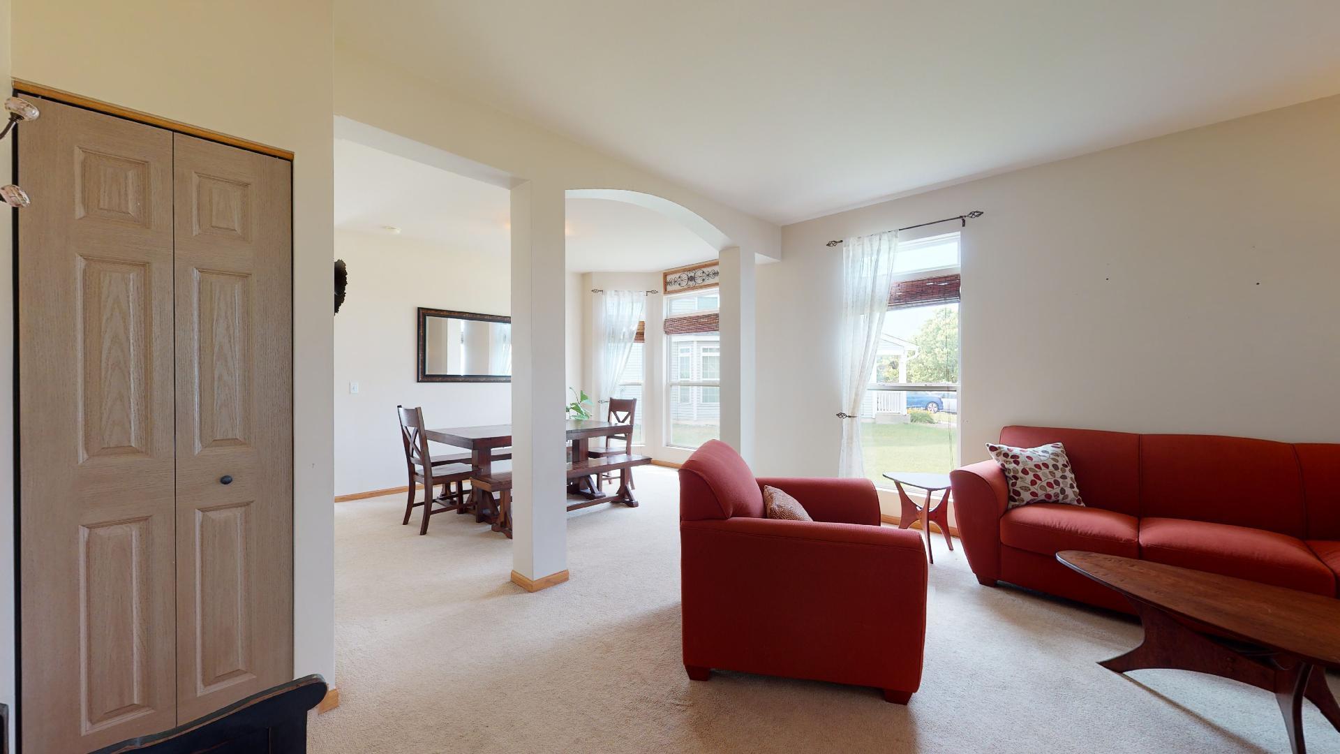 1637 Trails End Lane Bolingbrook, IL 60490 - Photo 2 of 40 a living room with furniture and a window