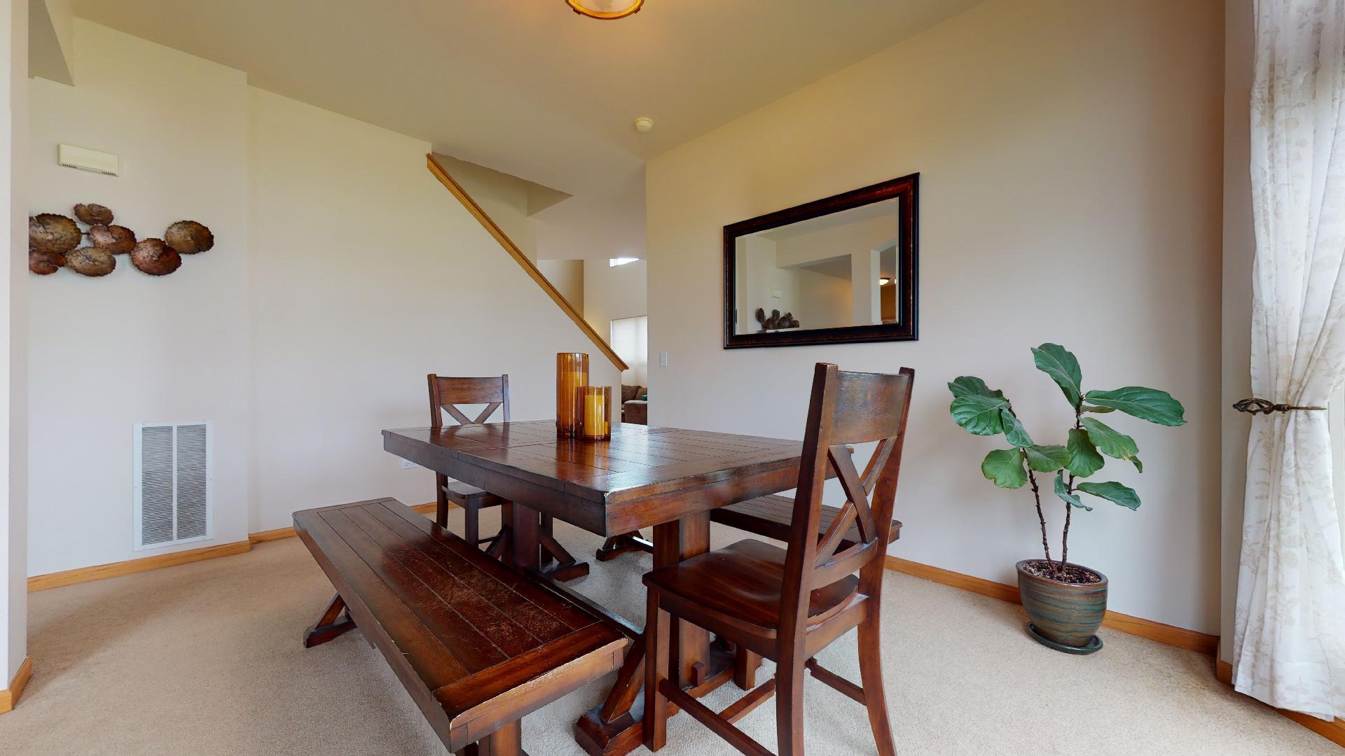 1637 Trails End Lane Bolingbrook, IL 60490 - Photo 13 of 40 a view of a livingroom with furniture and a potted plant