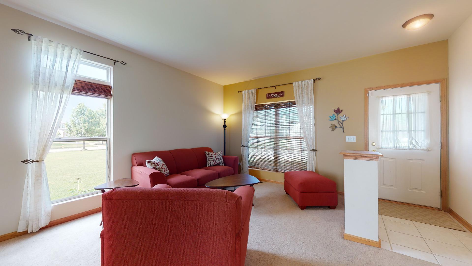 1637 Trails End Lane Bolingbrook, IL 60490 - Photo 3 of 40 a living room with furniture and a window