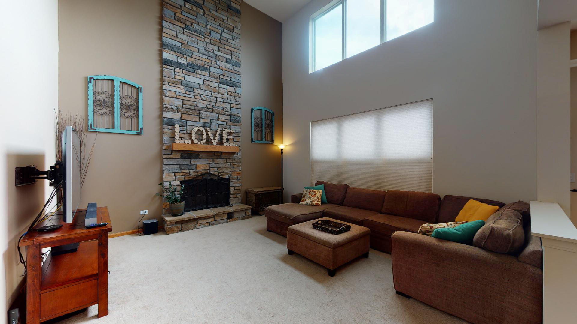 1637 Trails End Lane Bolingbrook, IL 60490 - Photo 22 of 40 a living room with furniture a fireplace and a window