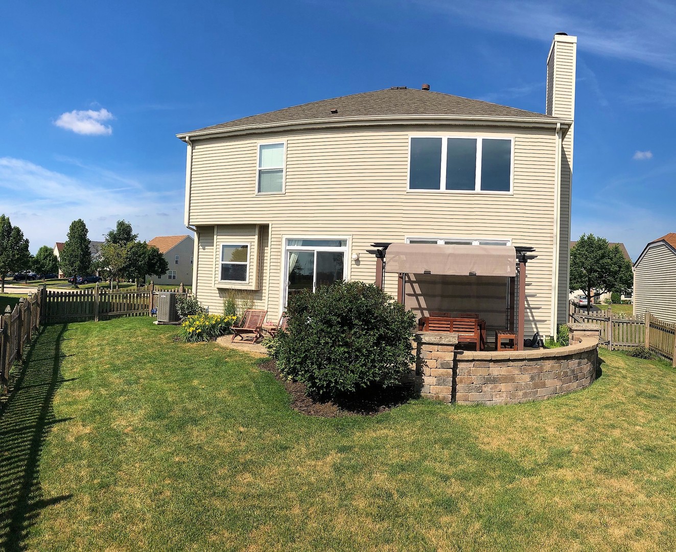 1637 Trails End Lane Bolingbrook, IL 60490 - Photo 29 of 40 a front view of a house with a yard