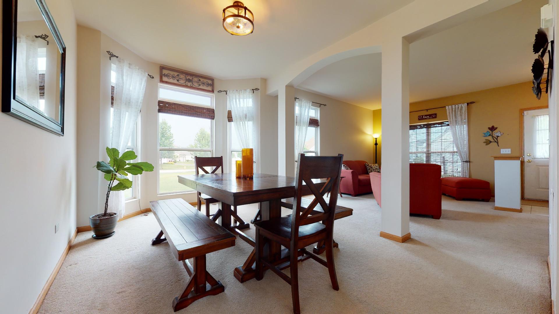 1637 Trails End Lane Bolingbrook, IL 60490 - Photo 4 of 40 a view of a dining room with furniture