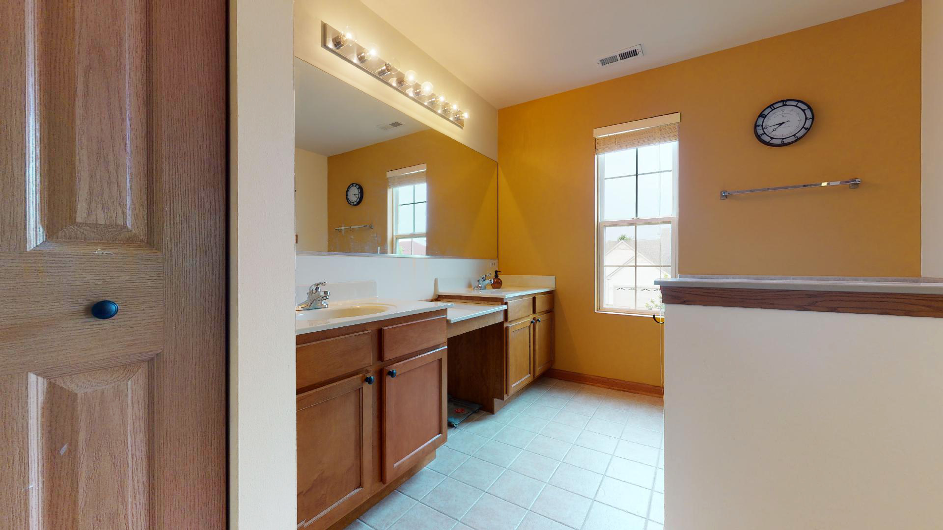 1637 Trails End Lane Bolingbrook, IL 60490 - Photo 38 of 40 a room with a wooden cabinets and sink