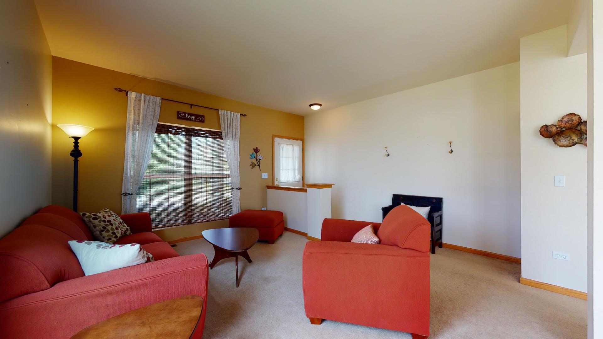 1637 Trails End Lane Bolingbrook, IL 60490 - Photo 5 of 40 a living room with furniture and a window