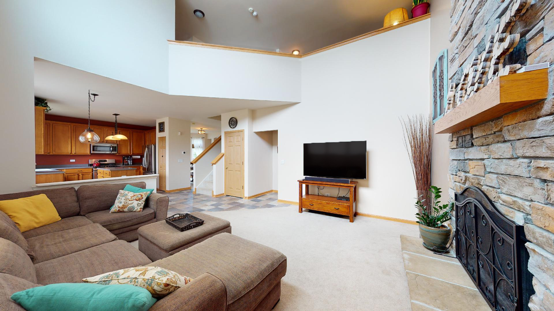 1637 Trails End Lane Bolingbrook, IL 60490 - Photo 8 of 40 a living room with furniture and a flat screen tv