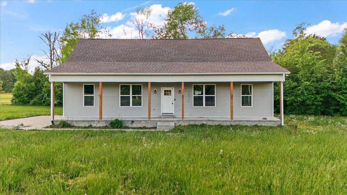 118 East Biggs Road Portland, TN 37148 - Photo 1 of 26 a house that has a lot of plants in it