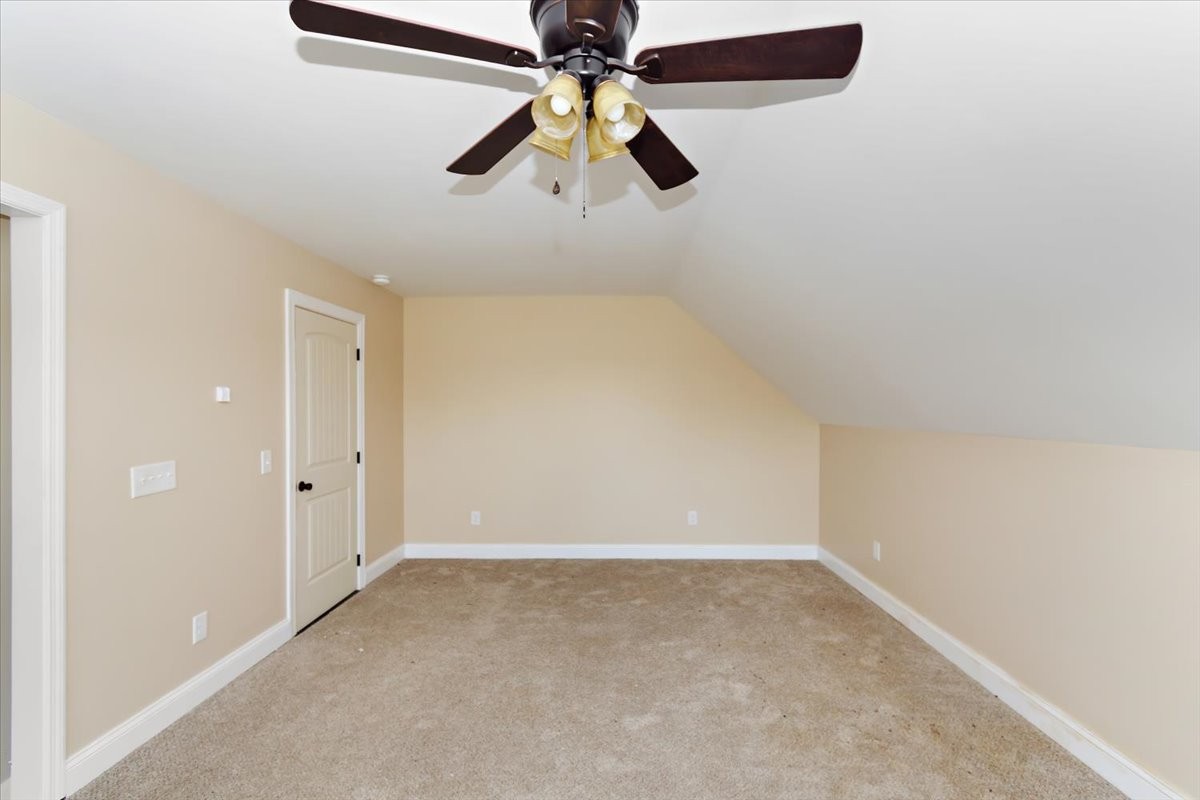 118 East Biggs Road Portland, TN 37148 - Photo 20 of 26 an empty room with ceiling fan and window