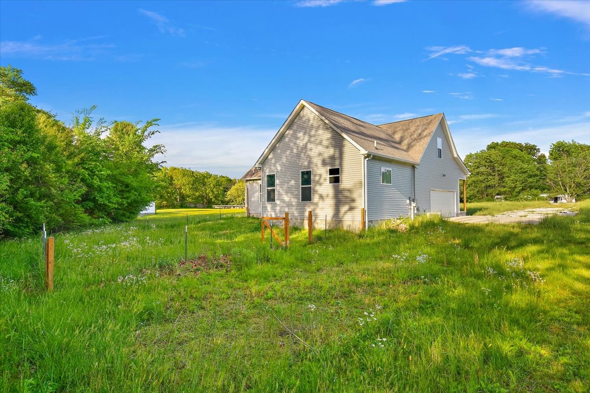 118 East Biggs Road Portland, TN 37148 - Photo 24 of 26 a view of a house with a big yard