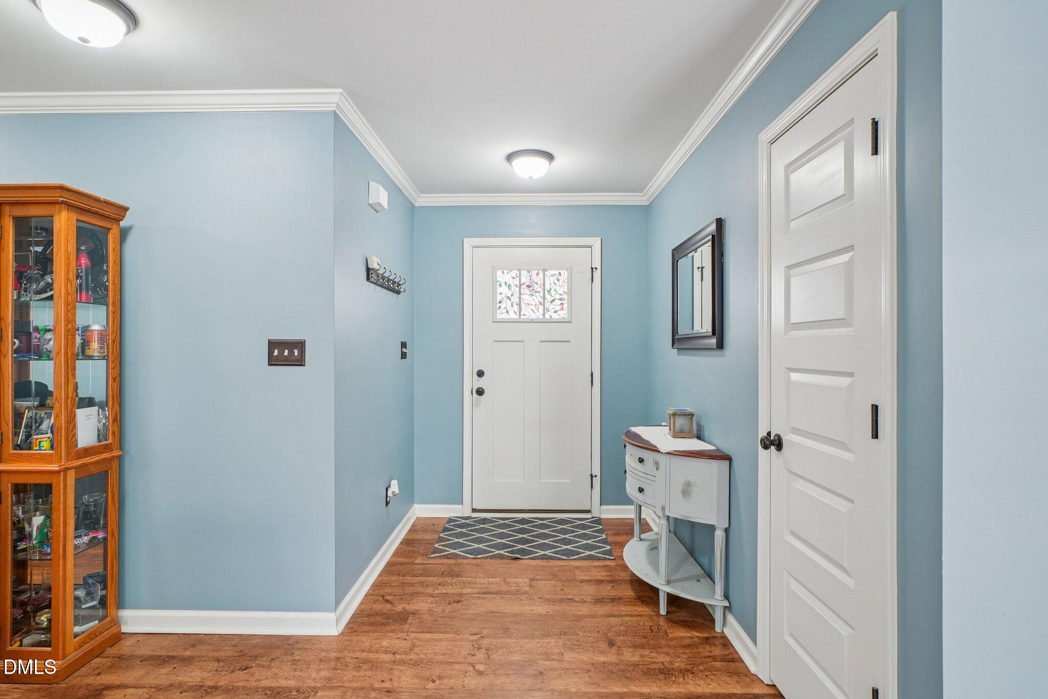 265 North Ridge Drive Louisburg, NC 27549 - Photo 5 of 33 a walk in closet with wooden floor