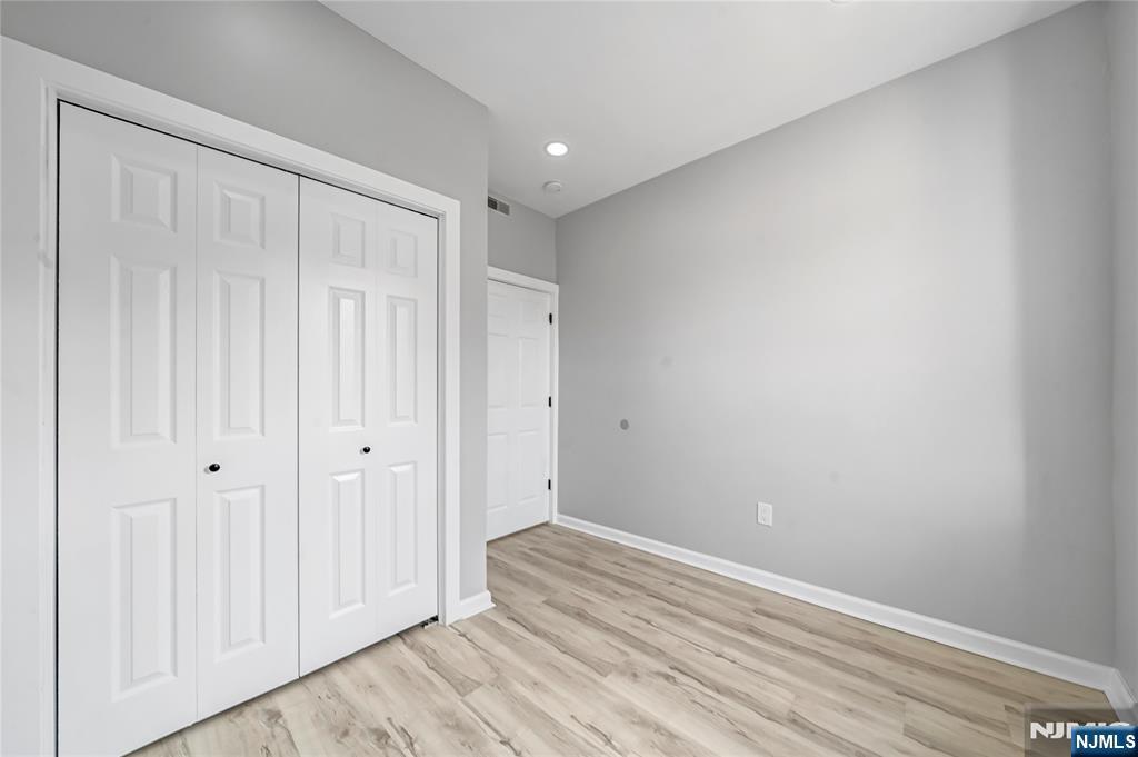 53 Henry Street, Unit D2 Passaic, NJ 07055 - Photo 6 of 12 a view of an empty room