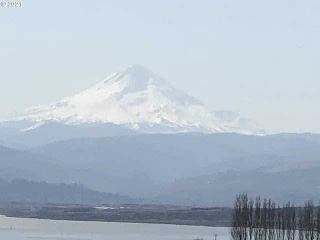 a view of a lake in front of a building