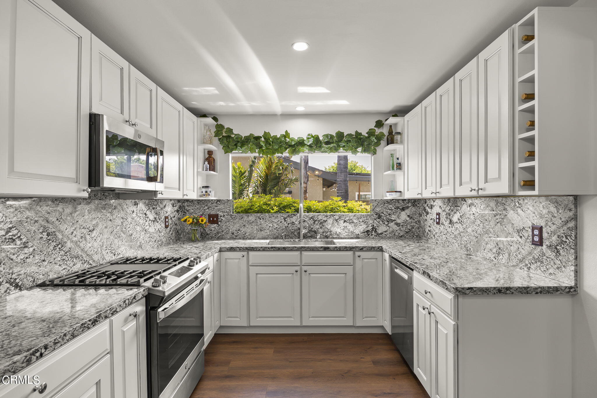 1162 Tico Road Ojai, CA 93023 - Photo 11 of 53 a kitchen with stainless steel appliances granite countertop a sink stove and cabinets