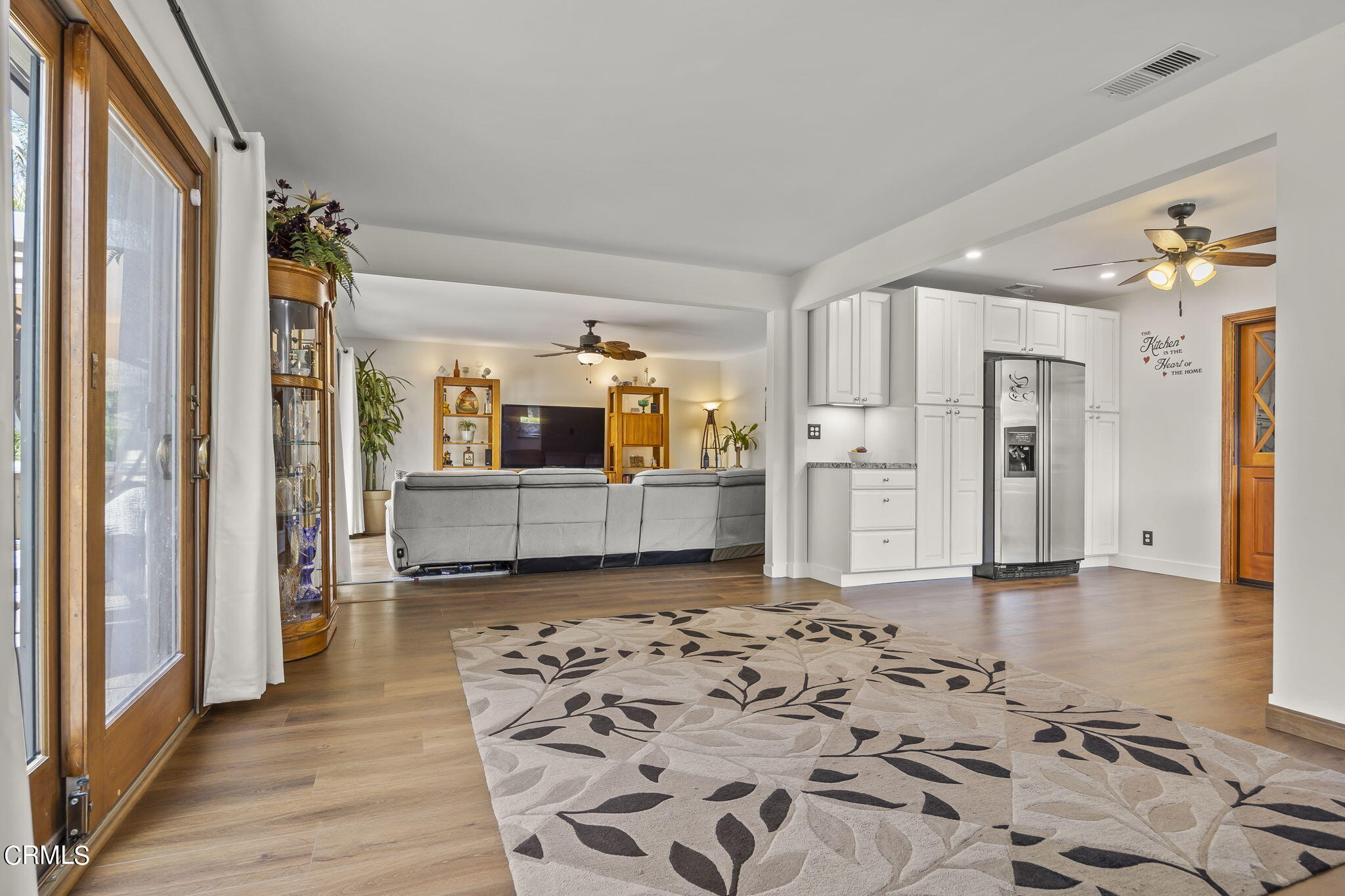 1162 Tico Road Ojai, CA 93023 - Photo 14 of 53 a view of a big room with wooden floor and windows