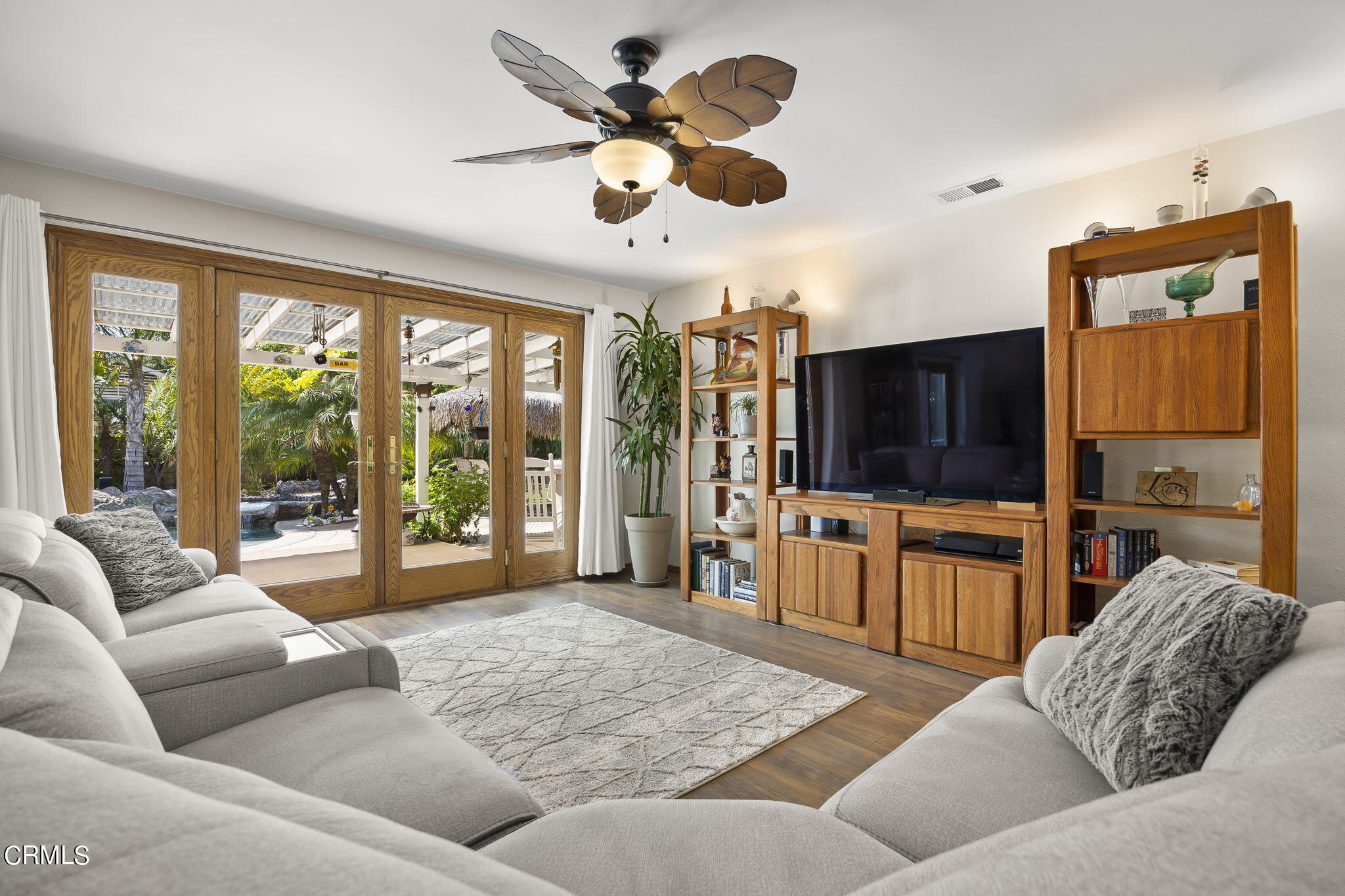 1162 Tico Road Ojai, CA 93023 - Photo 17 of 53 a living room with furniture and a flat screen tv