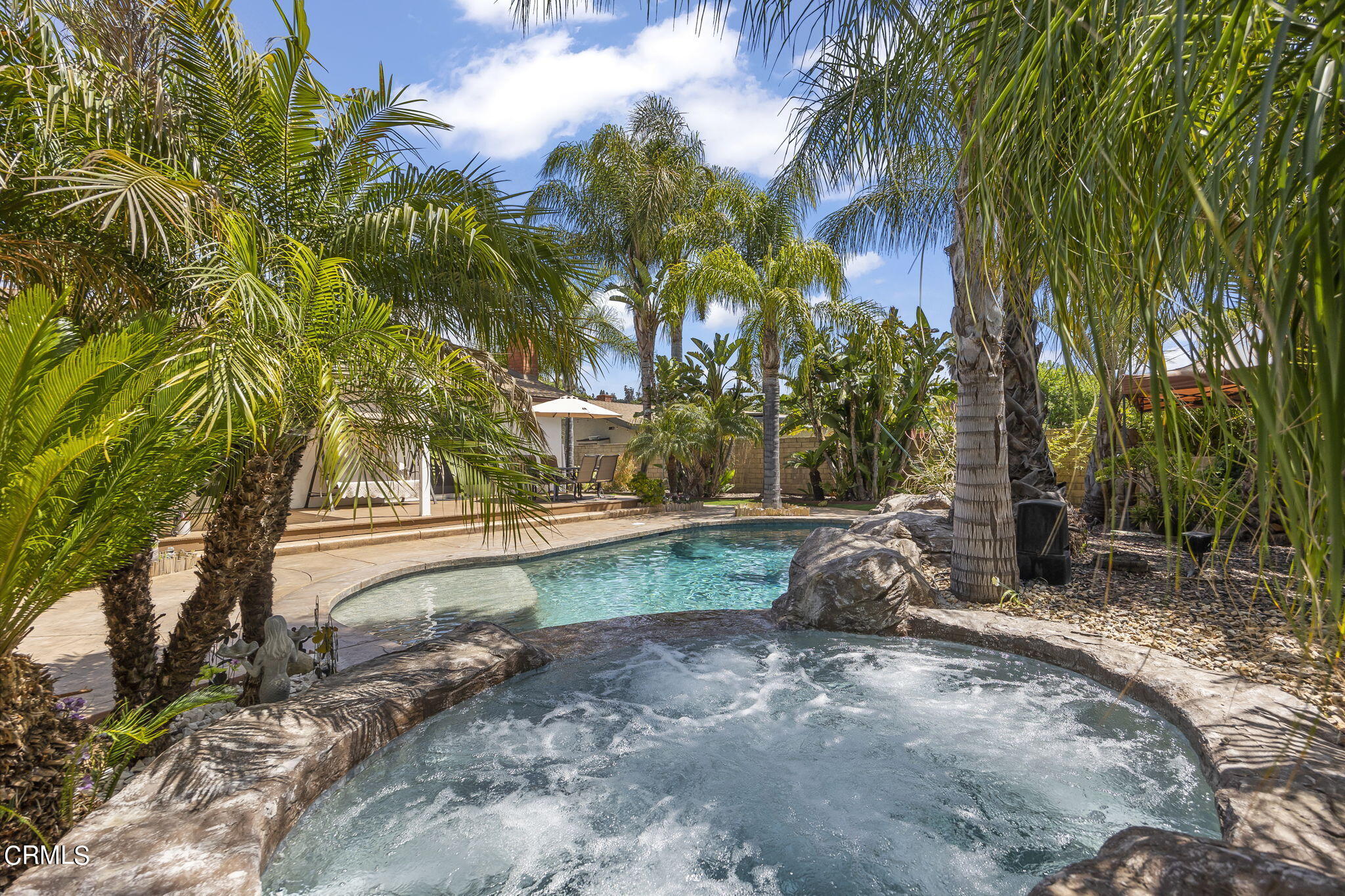 1162 Tico Road Ojai, CA 93023 - Photo 2 of 53 a backyard of a house with table and chairs