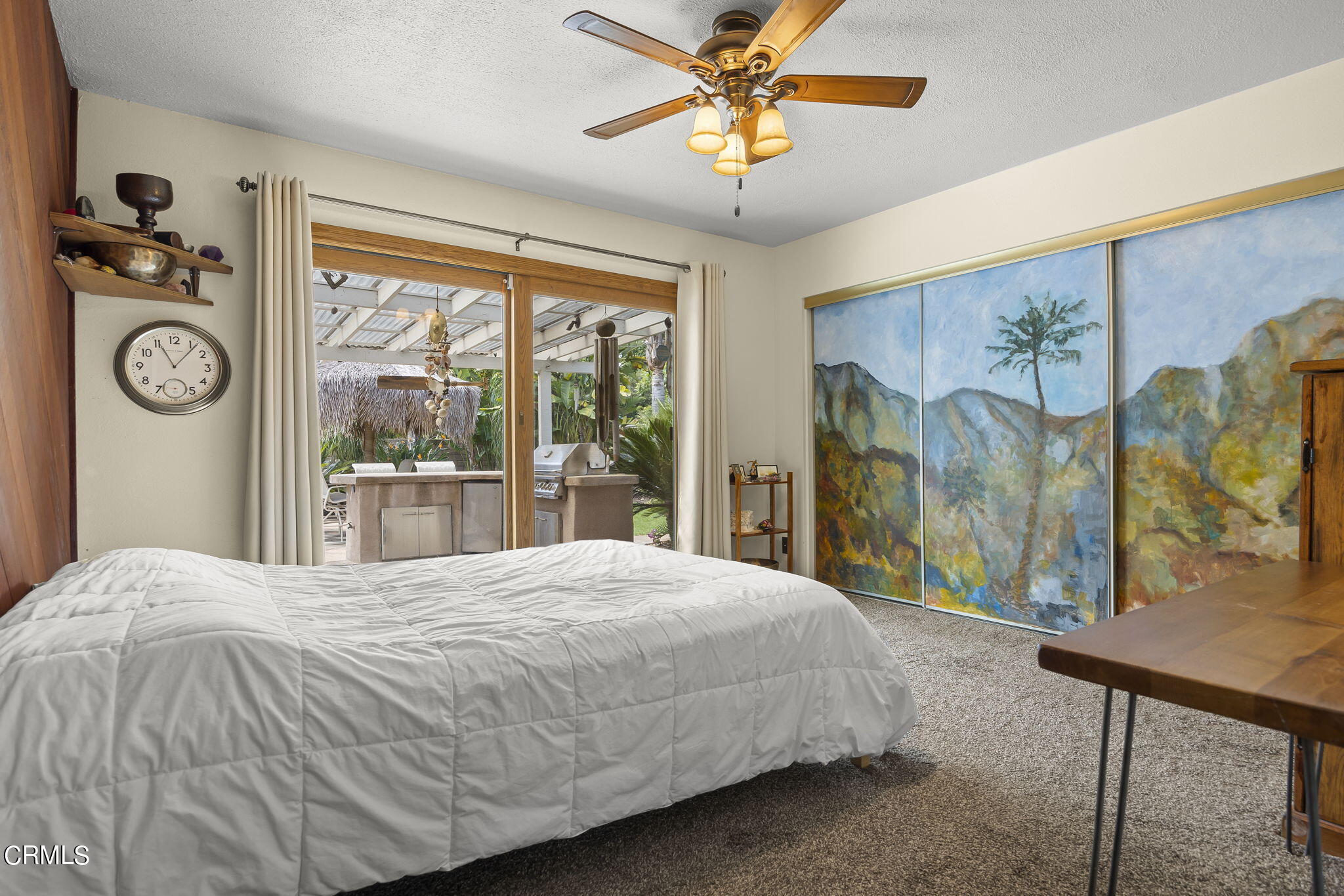 1162 Tico Road Ojai, CA 93023 - Photo 22 of 53 a bedroom with a bed and a table