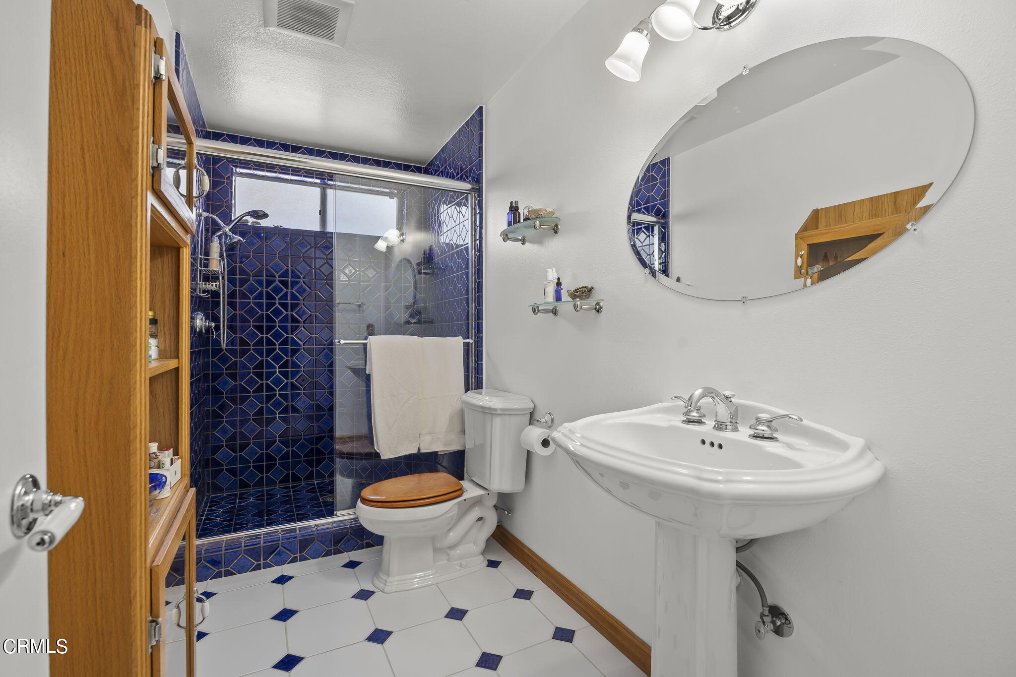 1162 Tico Road Ojai, CA 93023 - Photo 23 of 53 a bathroom with a sink toilet and shower