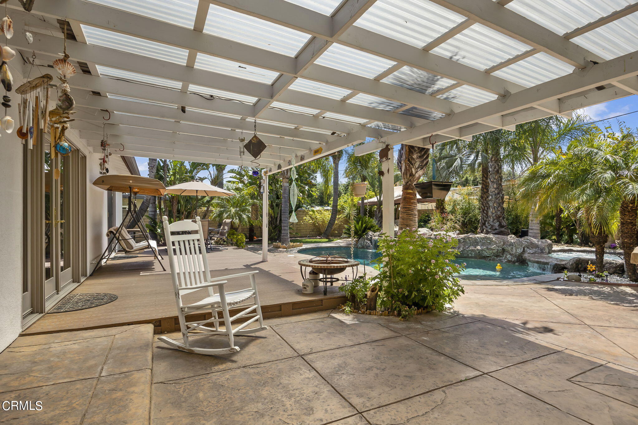 1162 Tico Road Ojai, CA 93023 - Photo 27 of 53 a view of a patio with table and chairs and potted plants