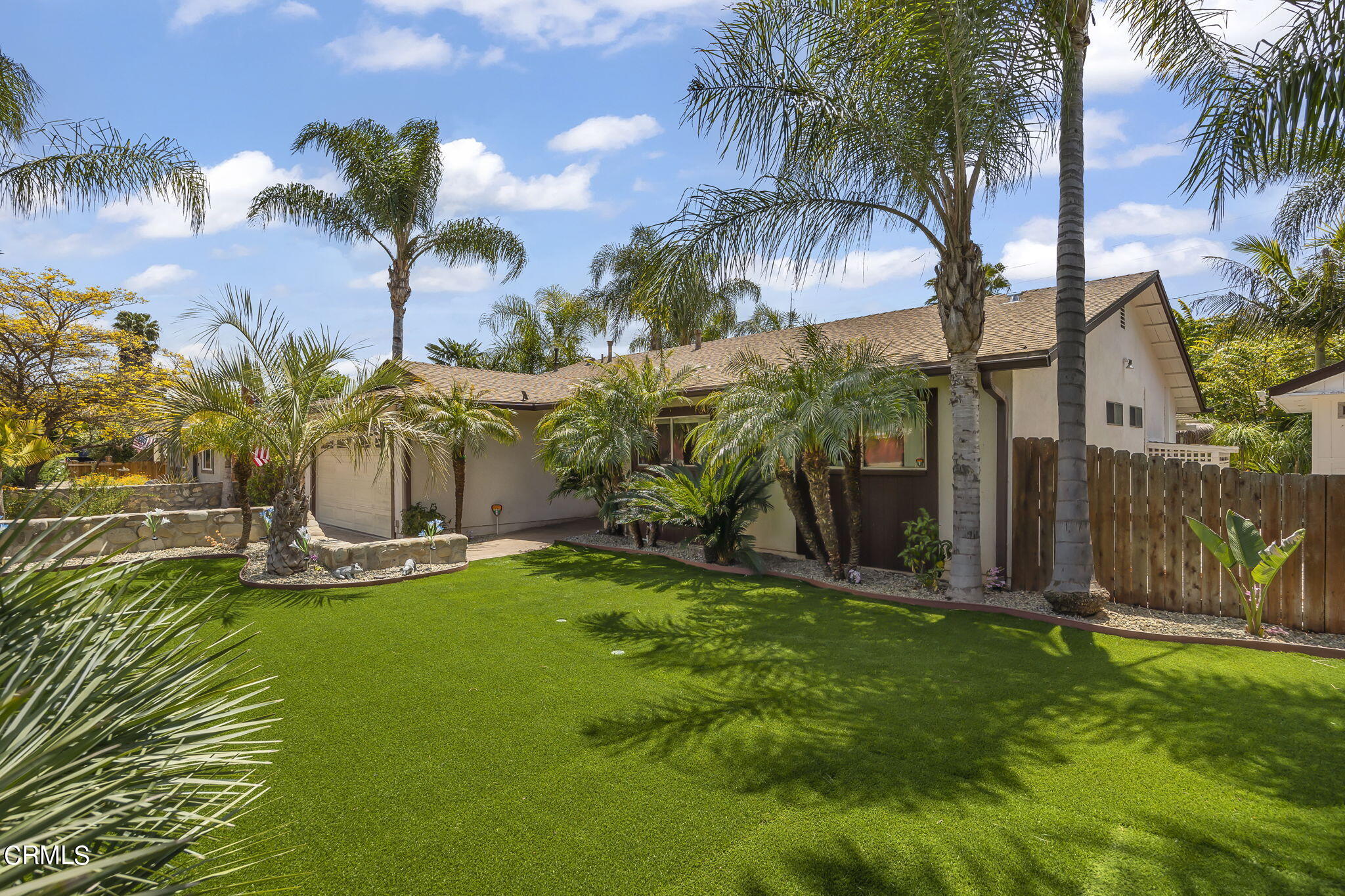 1162 Tico Road Ojai, CA 93023 - Photo 43 of 53 a backyard of a house with table and chairs