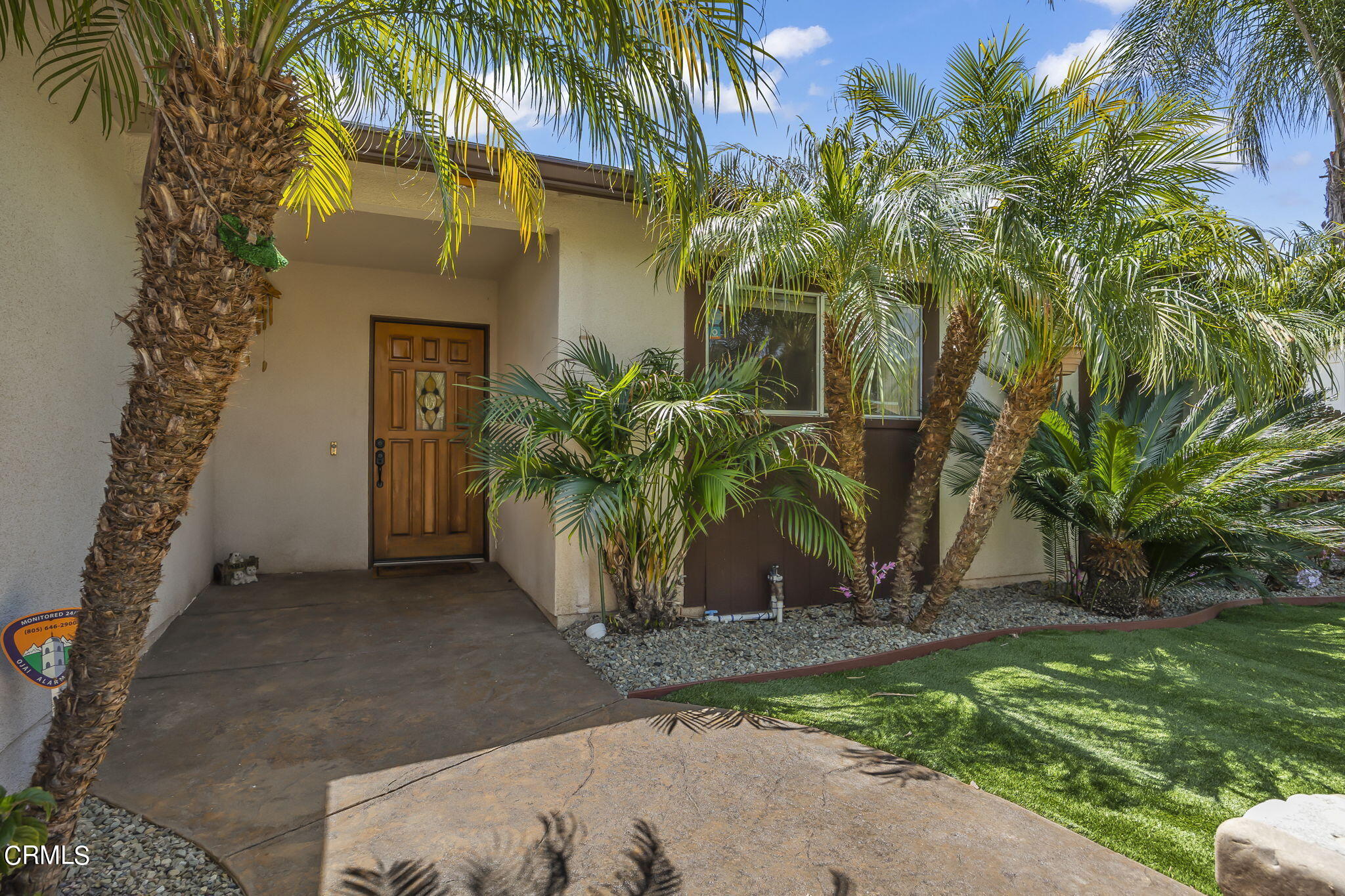 1162 Tico Road Ojai, CA 93023 - Photo 44 of 53 a view of a palm trees in front of a house