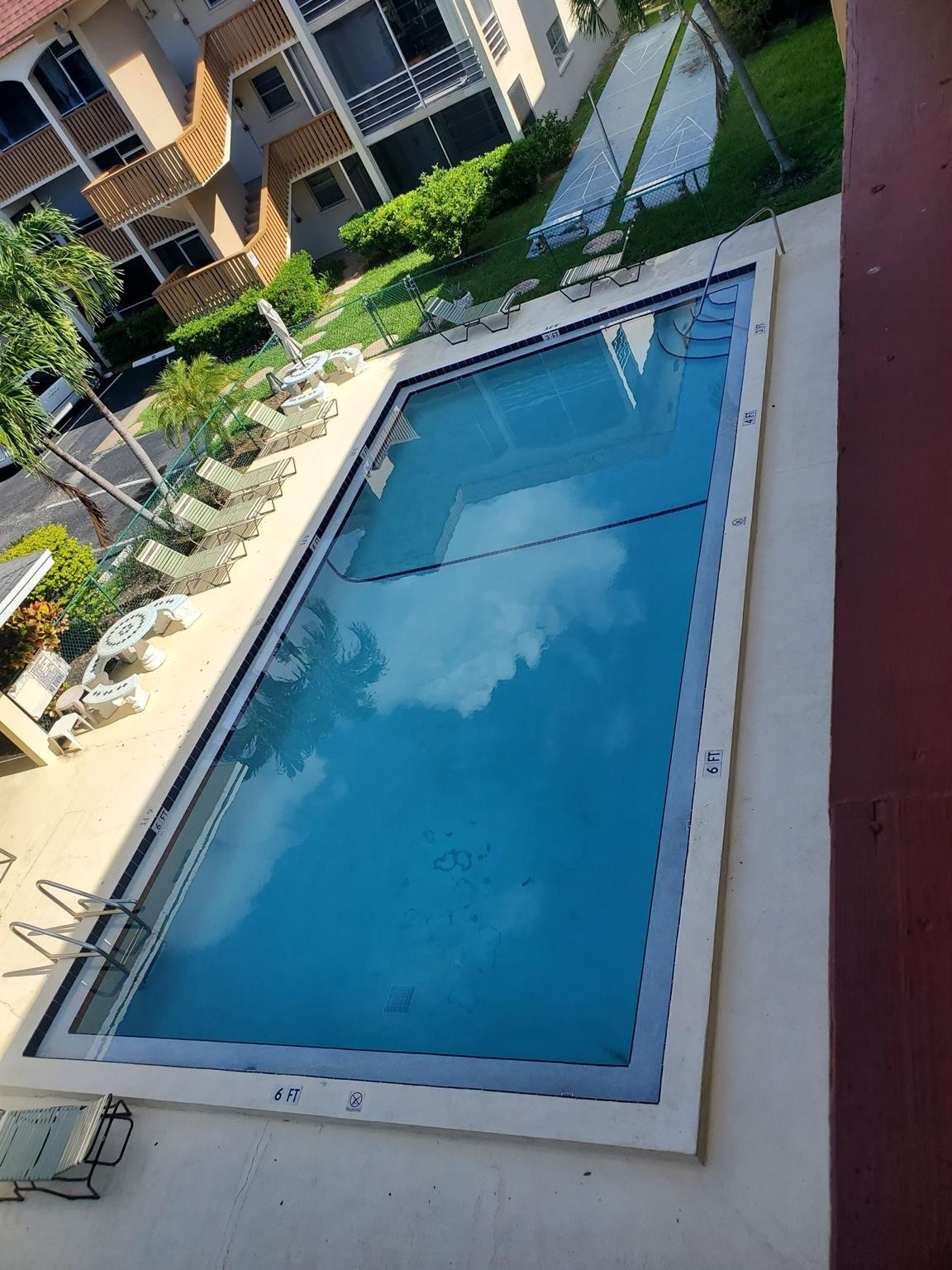 a view of backyard with green space