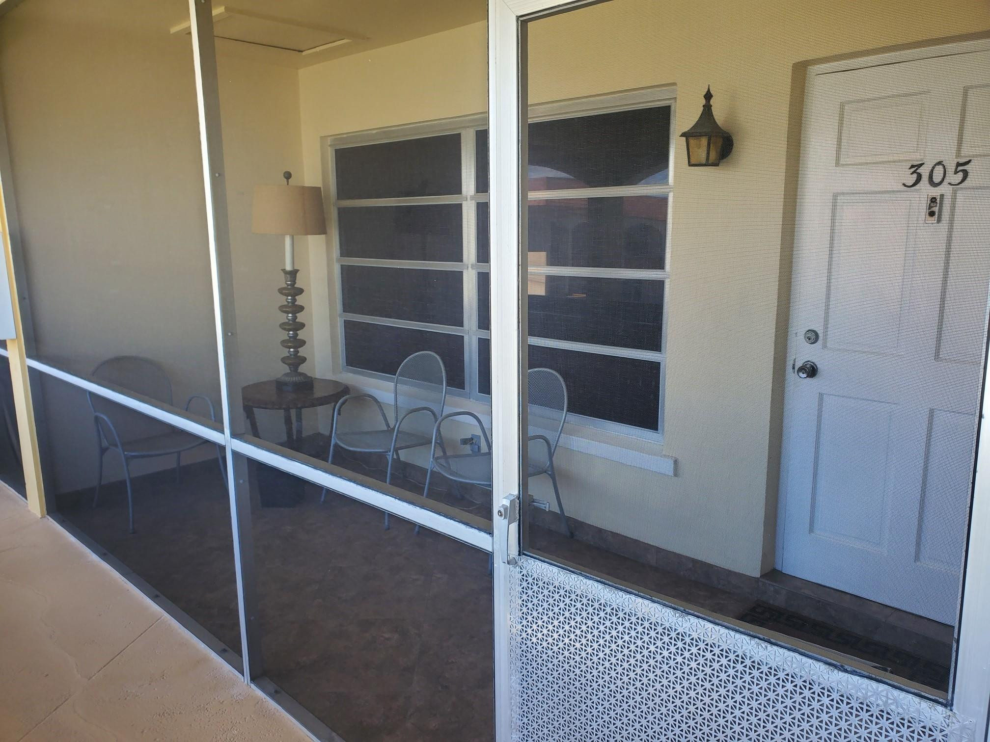 651 Pine Drive, Unit 305 Pompano Beach, FL 33060 - Photo 2 of 15 a room with walk in closet and bathroom